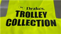 Heatpress DRAKES TROLLEY COLLECTION Logo Back CentreVestsBLACK Logo3 Lines of Text