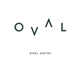 Embroidery Oval Hotel Logo Front Left Hand Side Wearingon Black Housekeeping UniformsGrey Logo